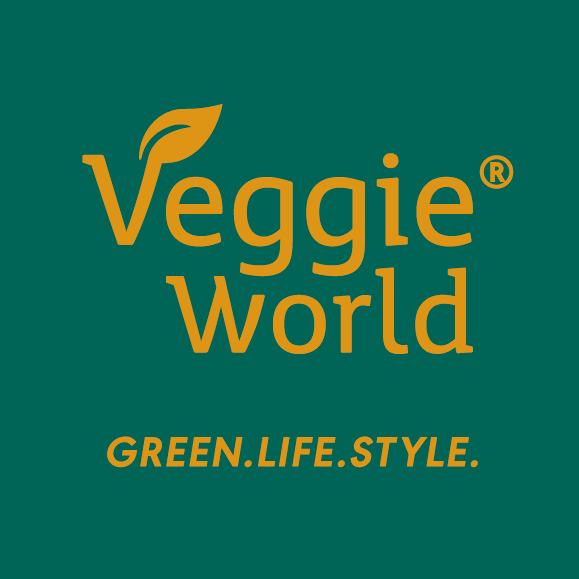 VeggieWorld_Logo_MitClaim_DarkGreen_Sand_CMYK (1)